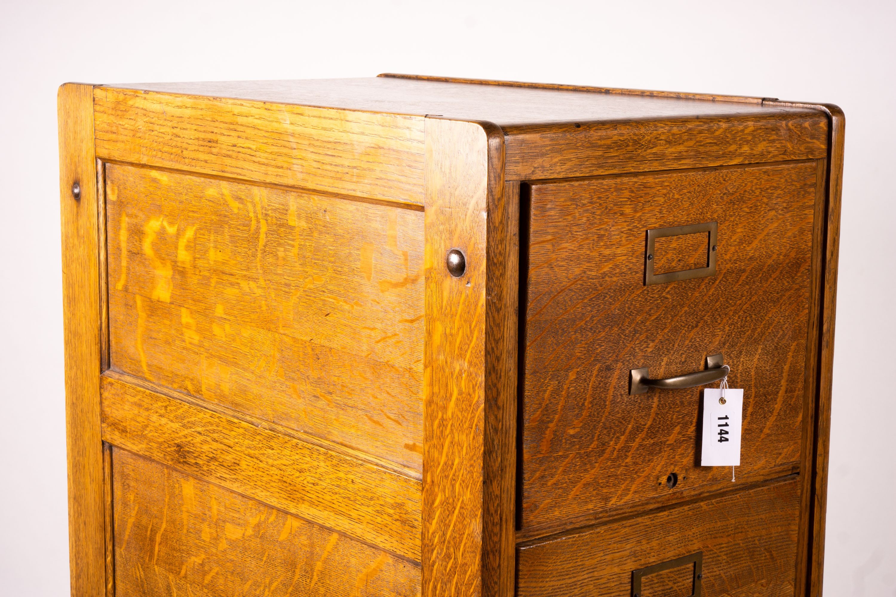 An early 20th century oak four drawer filing cabinet, W.44cm D.70cm. H.132cm